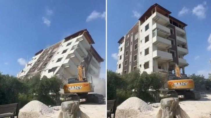 Hatay’da 7 katlı bina iş makinesi darbesiyle yerle bir oldu