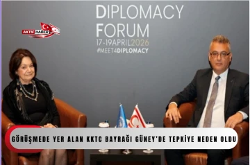 Erh&uuml;rman-Dicarlo g&ouml;r&uuml;şmesinde yer alan KKTC bayrağı Rum tarafının tepkisine neden oldu