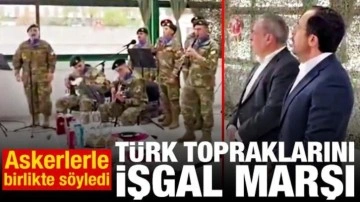 G&uuml;ney Kıbrıs lideri askerlerle birlikte işgal marşı okudu